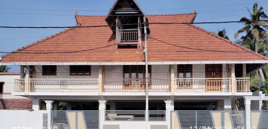 Serene Canal-Side Living – 5.5 Cent Homestay Property in Chungam