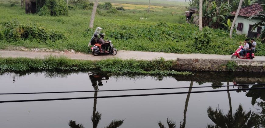 Serene Canal-Side Living – 5.5 Cent Homestay Property in Chungam