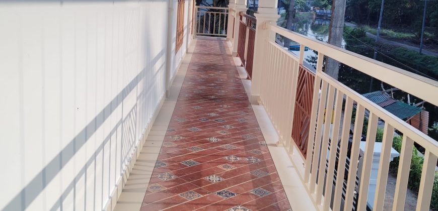 Serene Canal-Side Living – 5.5 Cent Homestay Property in Chungam